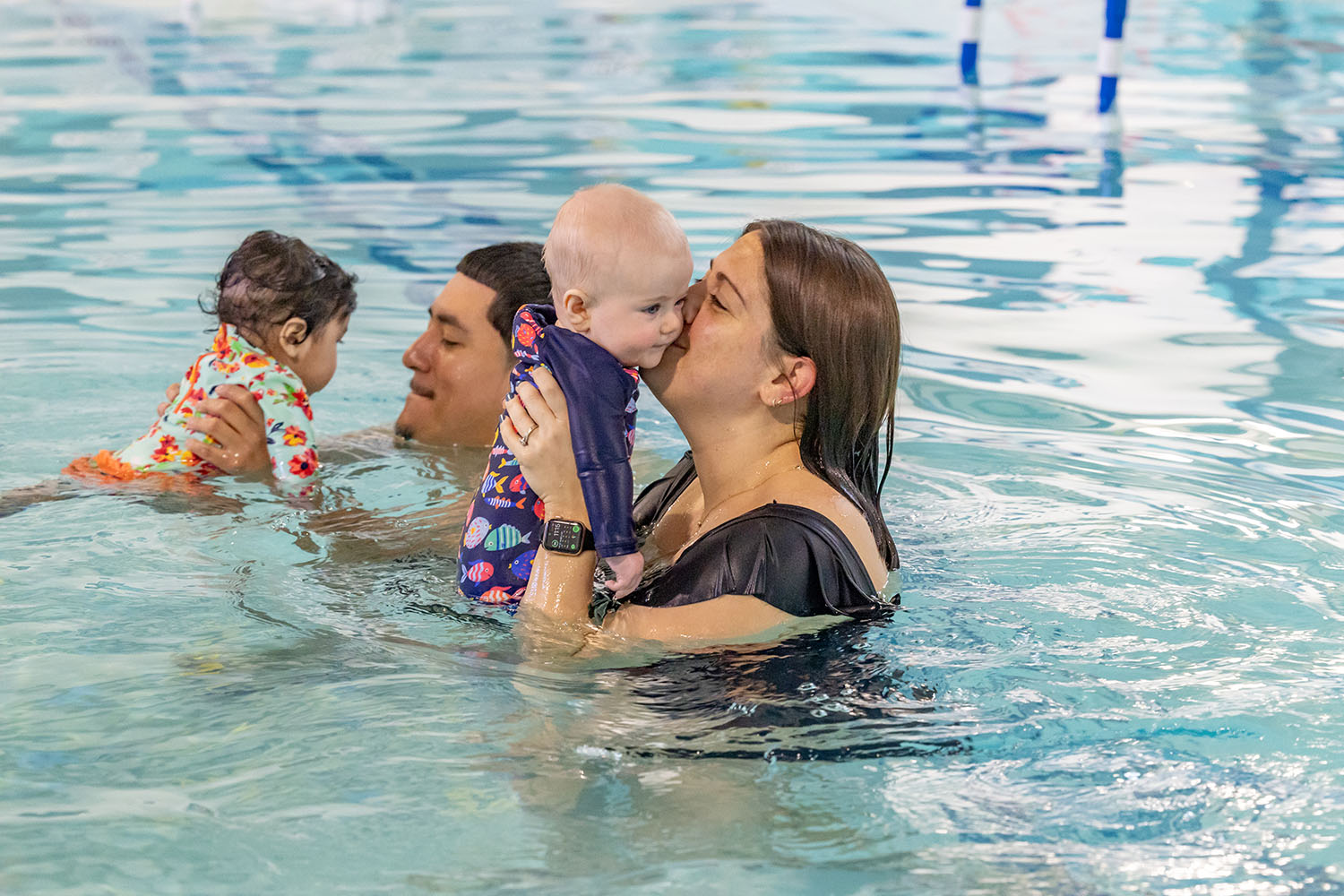 Parents and babies in pool together