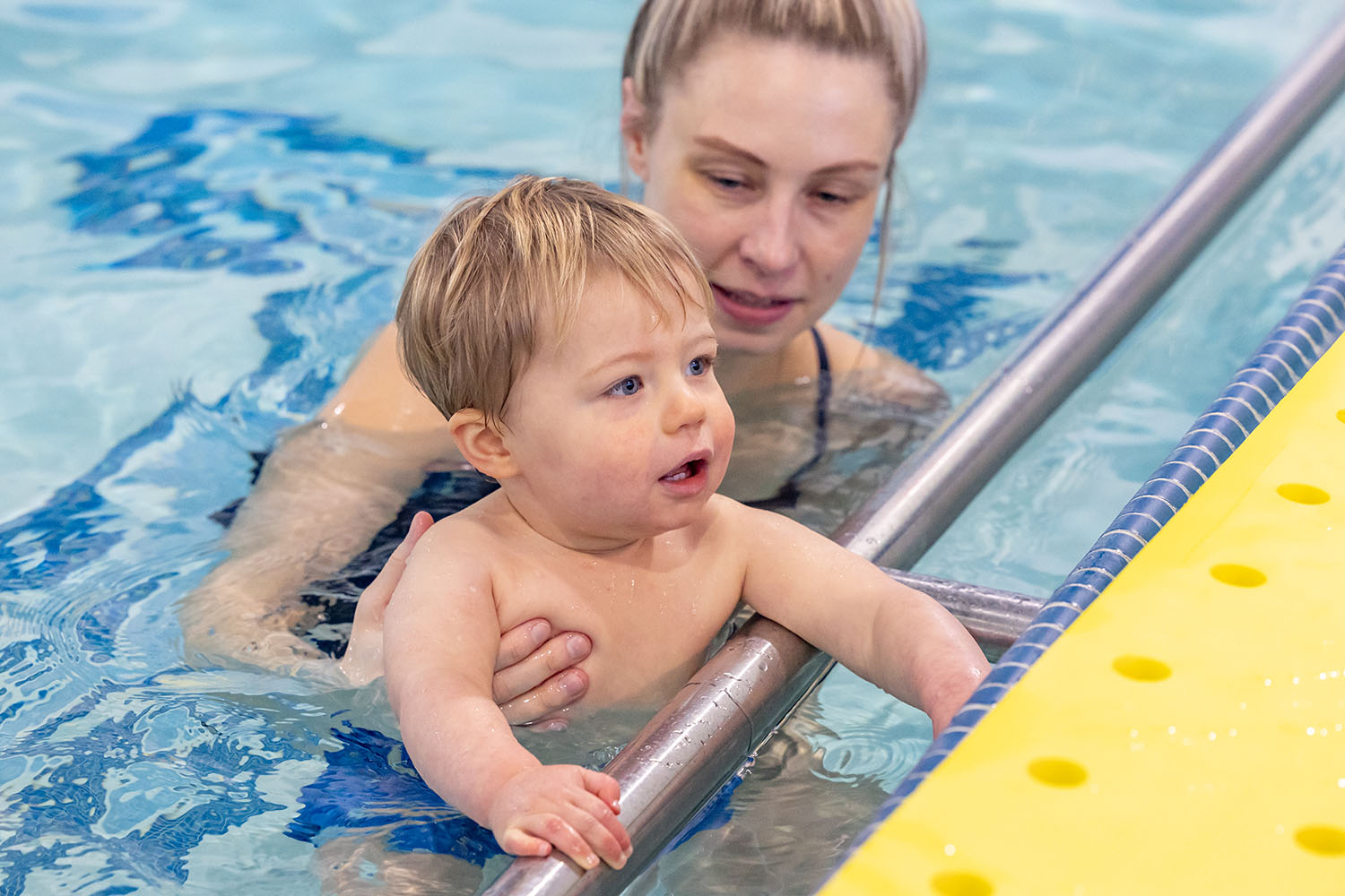 Toddler getting used to the water